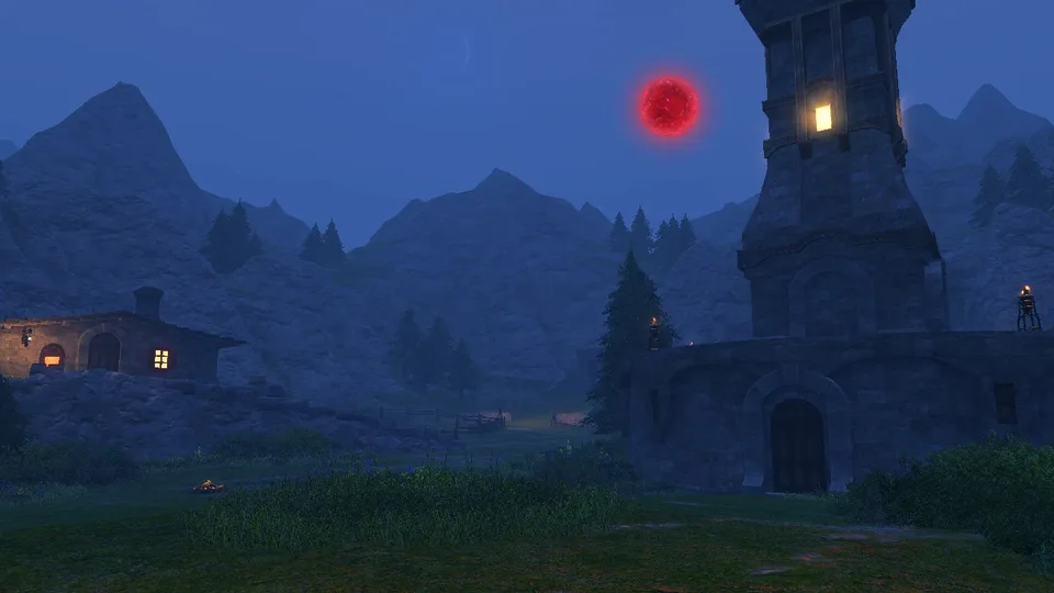 A night view of a stone tower and houses with a red moon in the sky.