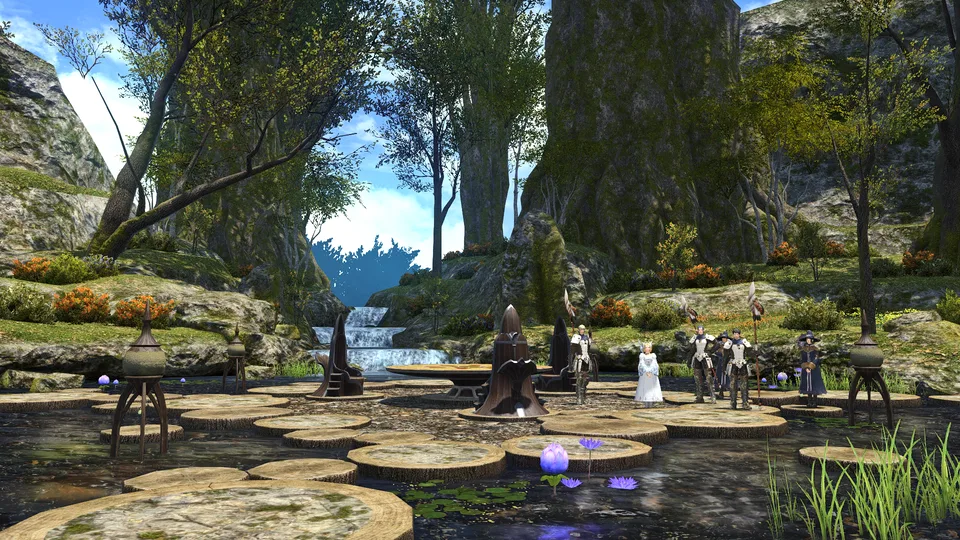 A small group of player characters in armor and robes stands on wooden stepping platforms in a forest pond with a waterfall behind them.