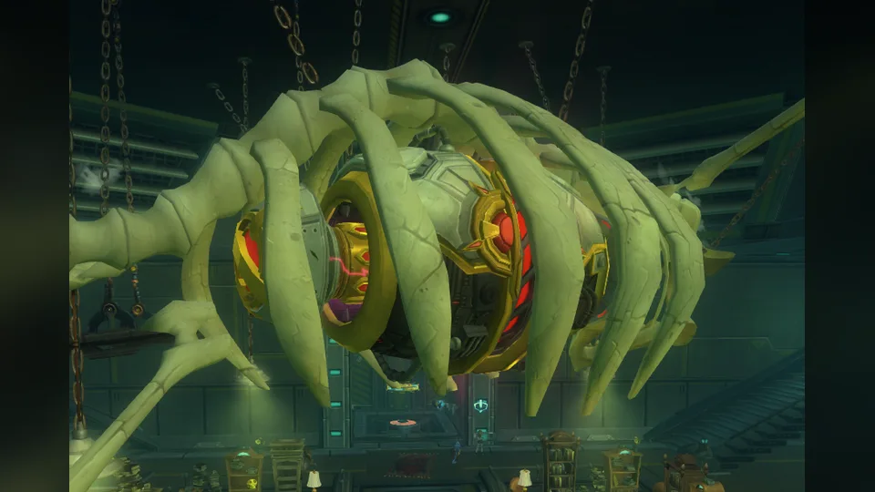 A giant pale bone-like creature with a golden mechanical core hangs from chains inside a dark industrial hall.